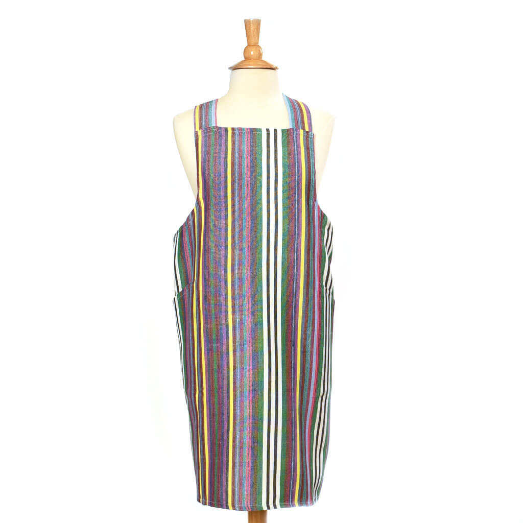 greens, blues, magenta and white. Crossback apron. 
