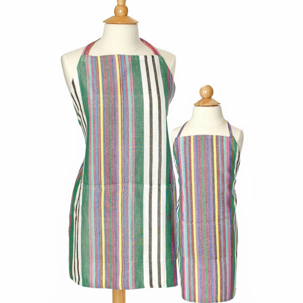 Child and adult matching aprons greens, blues, pinks and bright whites stripes. 