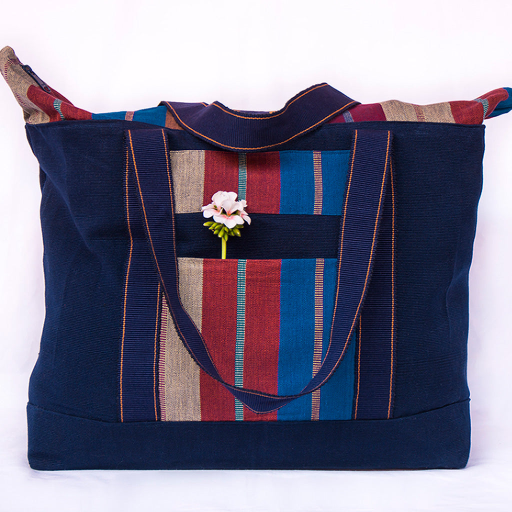 Wide indigo weekender bag.