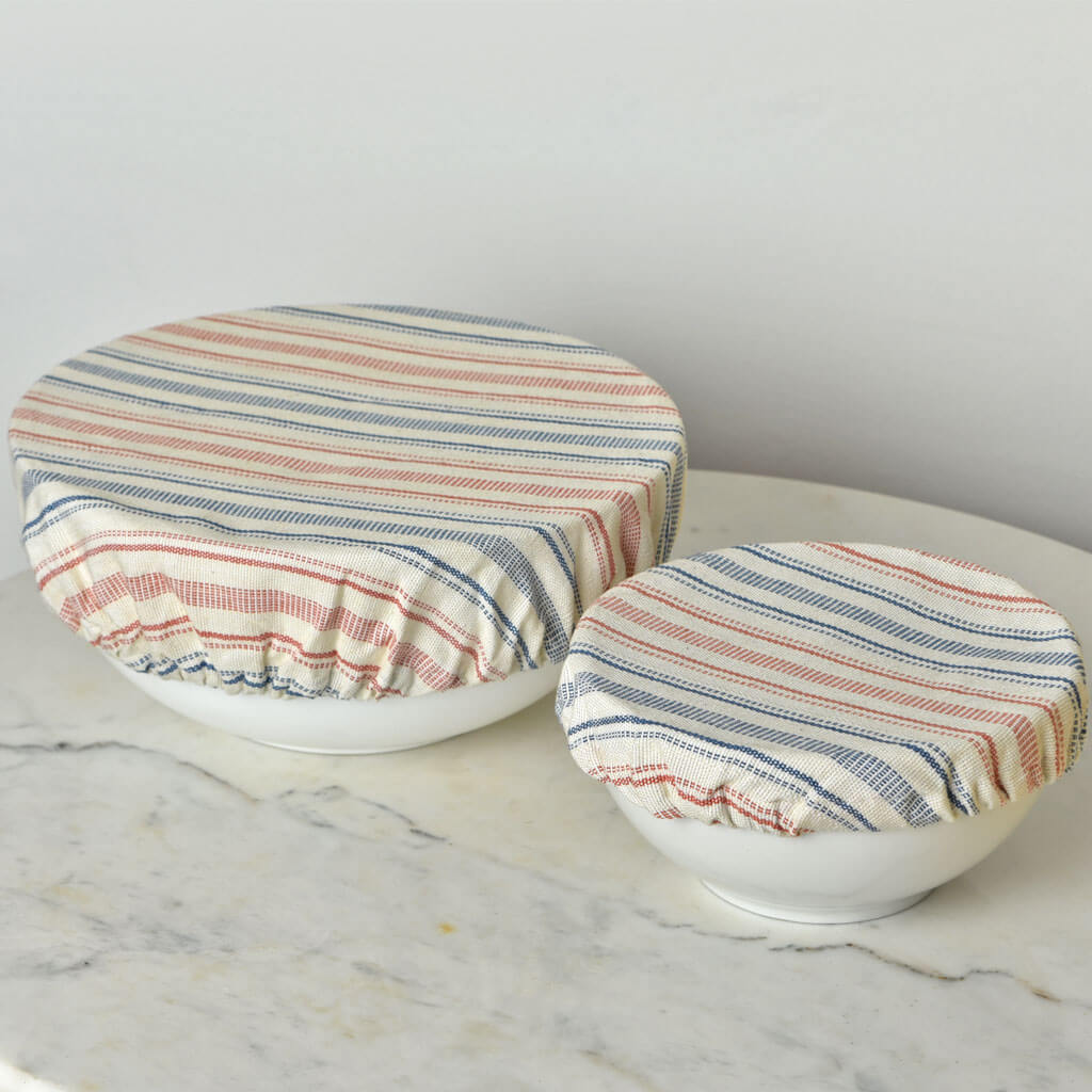 Large and small ticking and blue stripes bowl cover. 