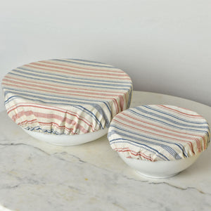 Large and small ticking and blue stripes bowl cover. 