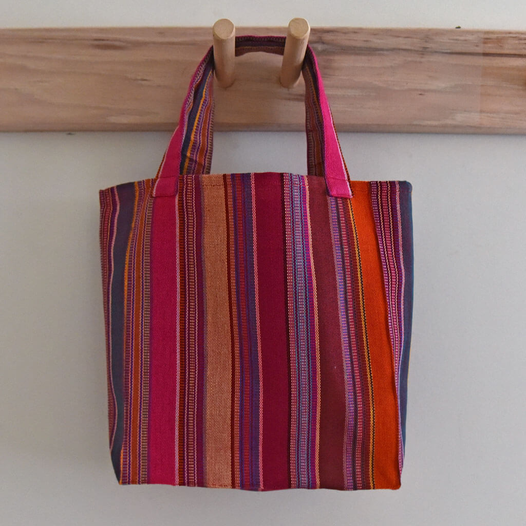 Magenta child size mini market tote.