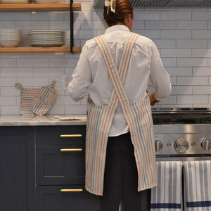 Brown, blue and white crossback apron. 