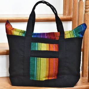 Rainbow striped weekender bag. 